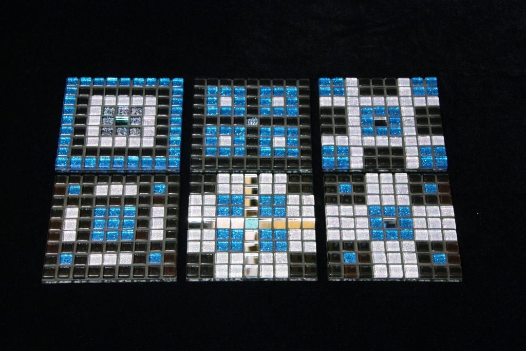 Set of six blue, black and white mosaic coasters commission